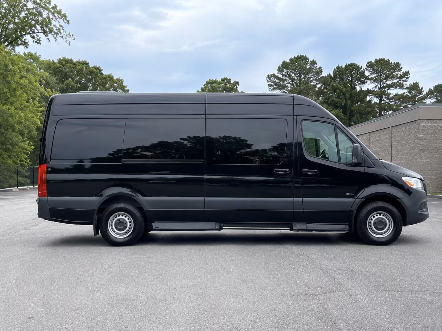orange 10 passenger sprinter van