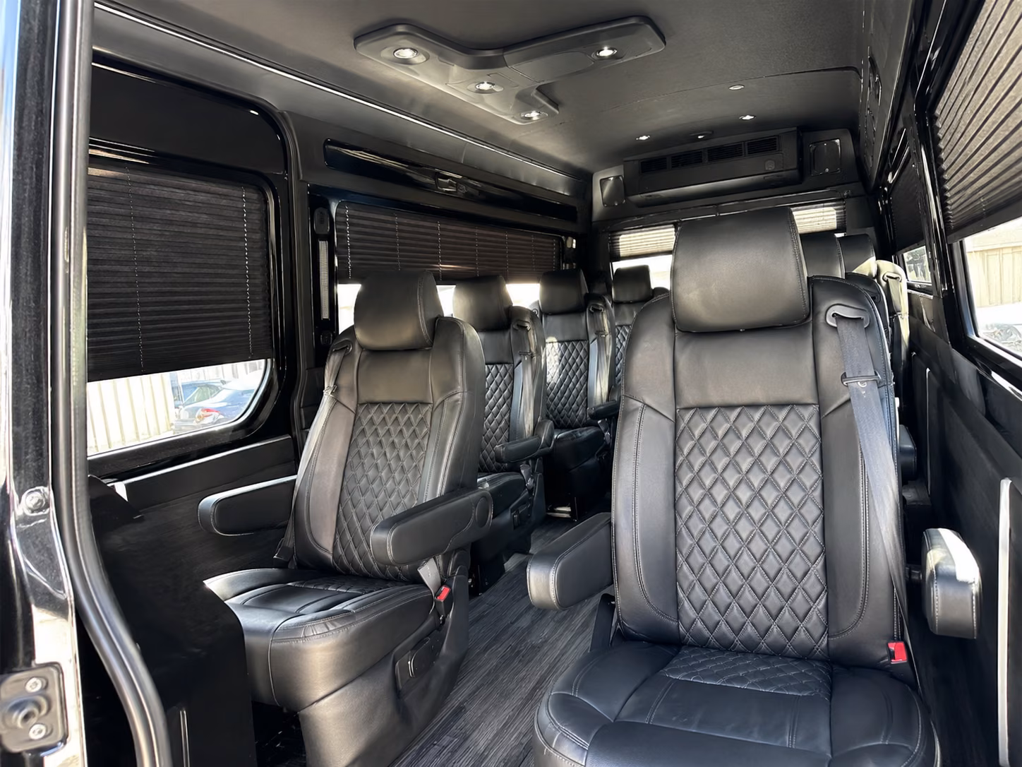 orange 12 passenger sprinter van inside