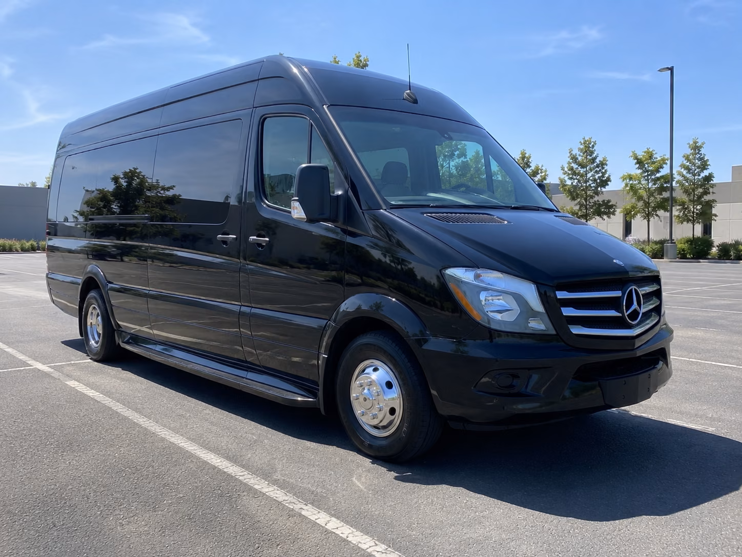 orange 12 passenger sprinter van