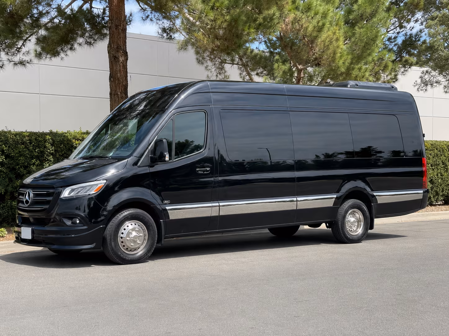 orange 18 passenger sprinter van