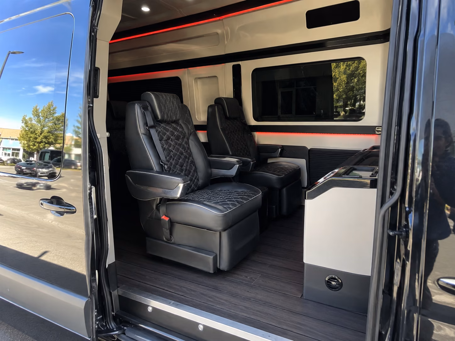 orange 20 passenger sprinter van inside