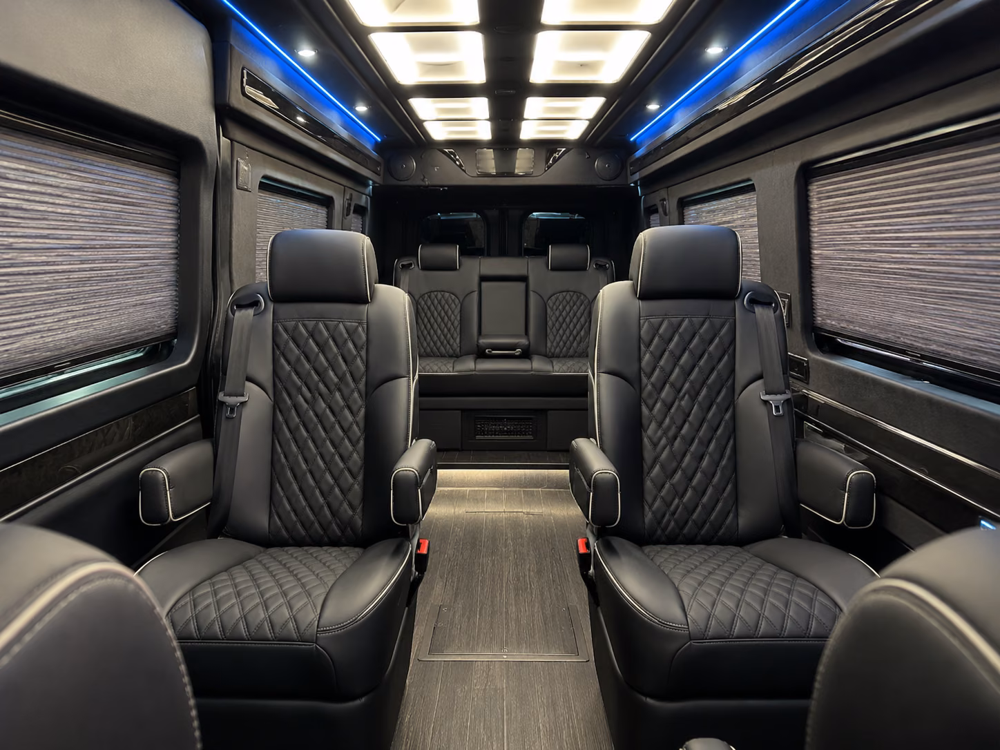 orange 20 passenger sprinter van interior